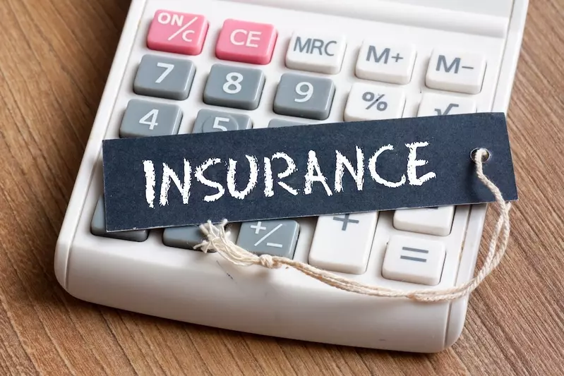 insurance written over calculator